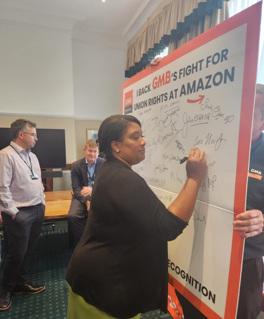 Bell signs a pledge to support striking Amazon workers at GMB's Parliamentary drop-in 