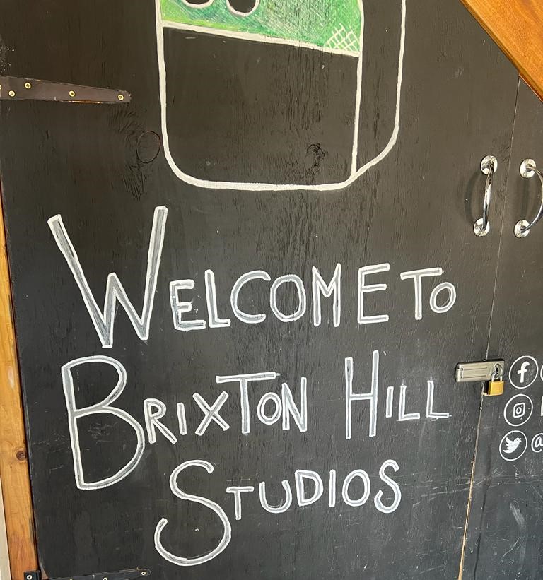 Welcome to Brixton Hill Studios sign