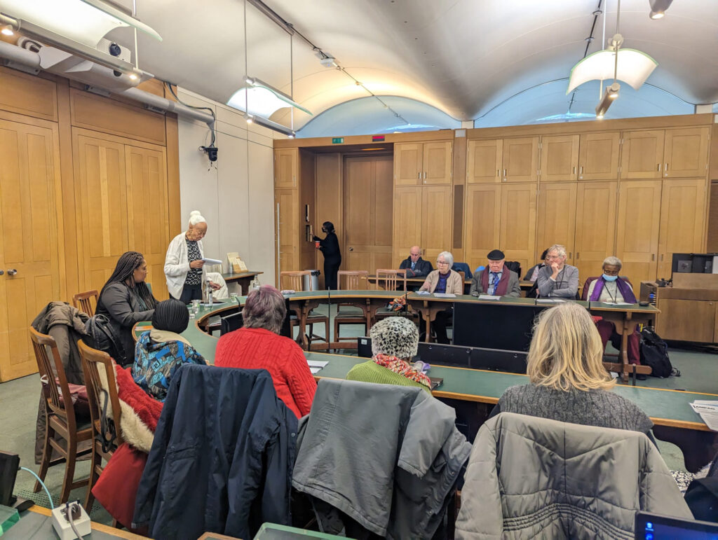 Lambeth pensioners ask Bell questions in a parliamentary committee room.