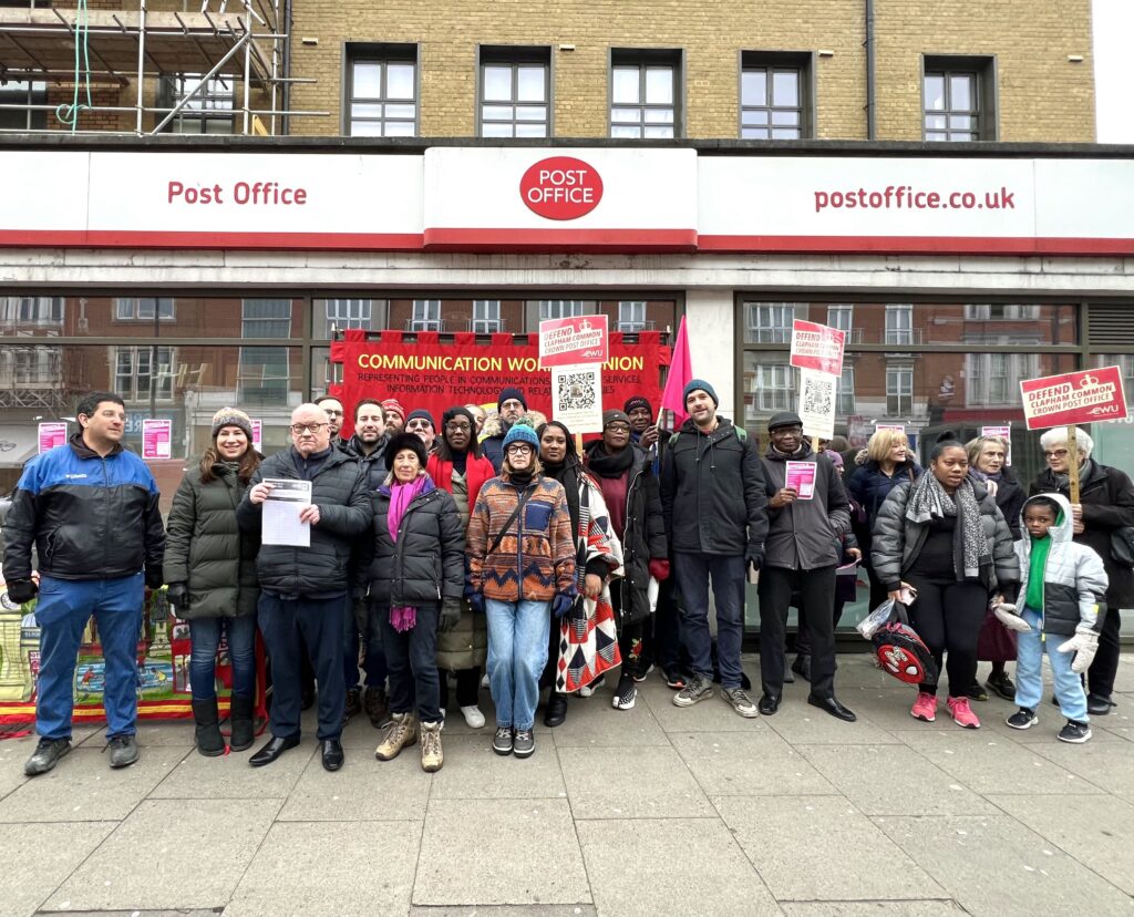 Bell stands outside the Clapham Common Post Office with local Labour councillors, CWU members and members of the public.